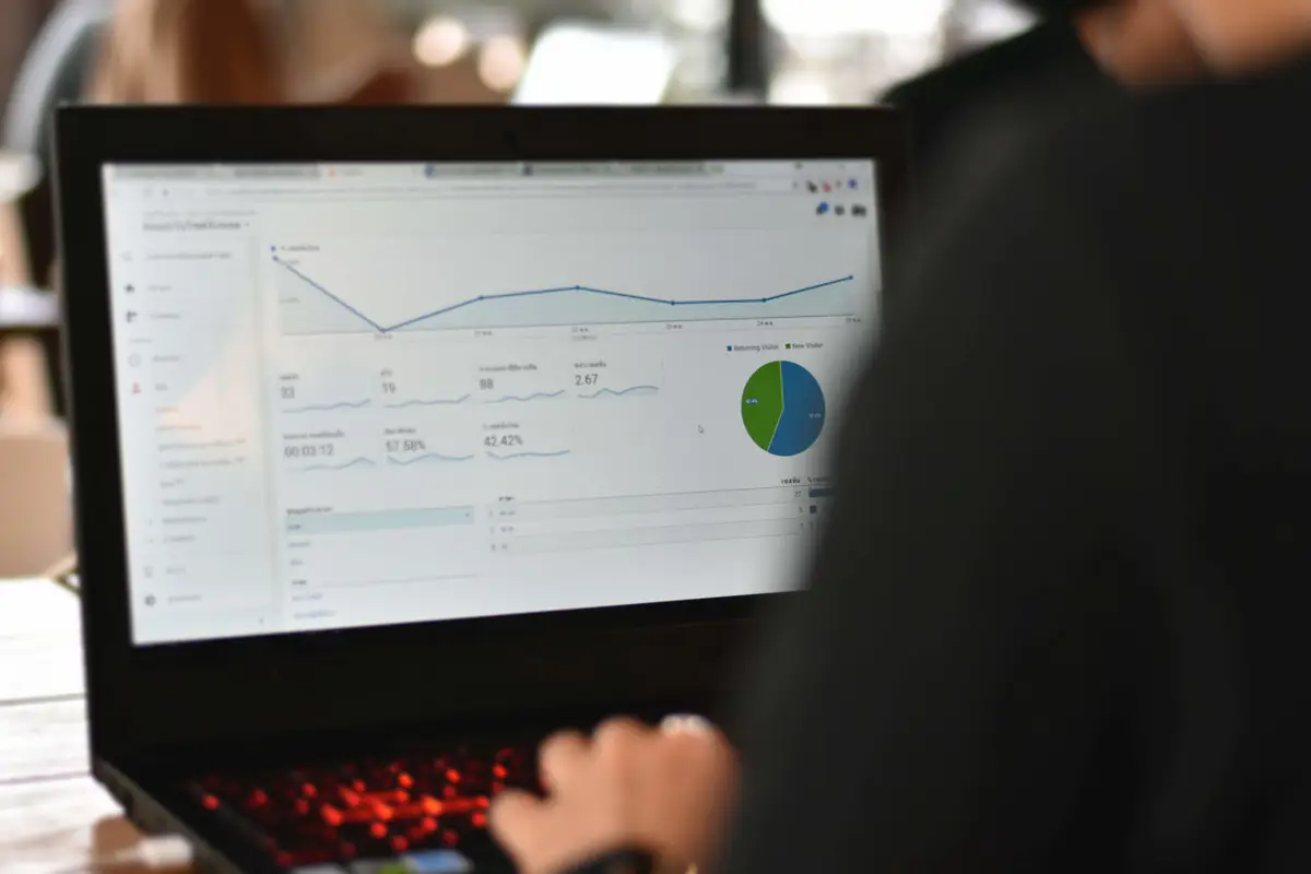 worker checking website traffic visitor on analytics report