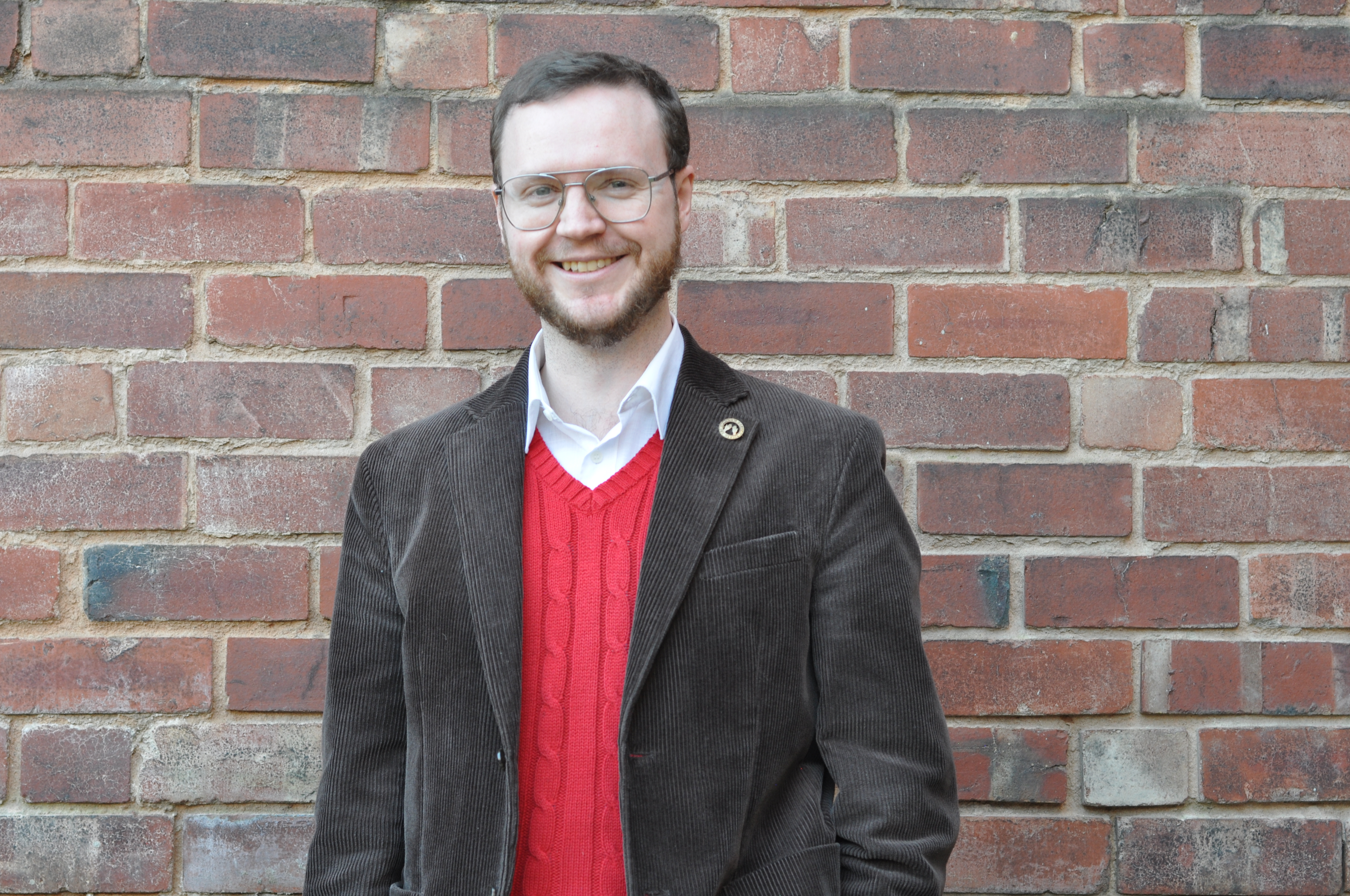 Image of Mark on brick background